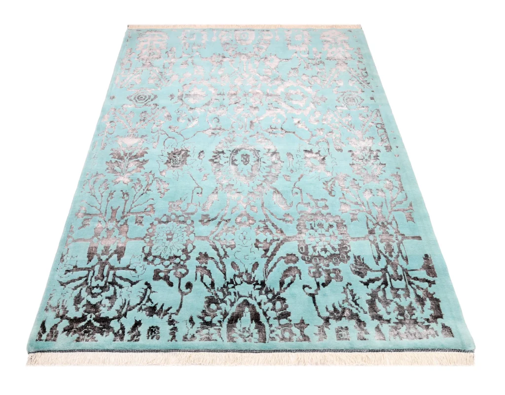 فرش دستباف کرک و ابریشم آبی فیروزه‌ای روشن